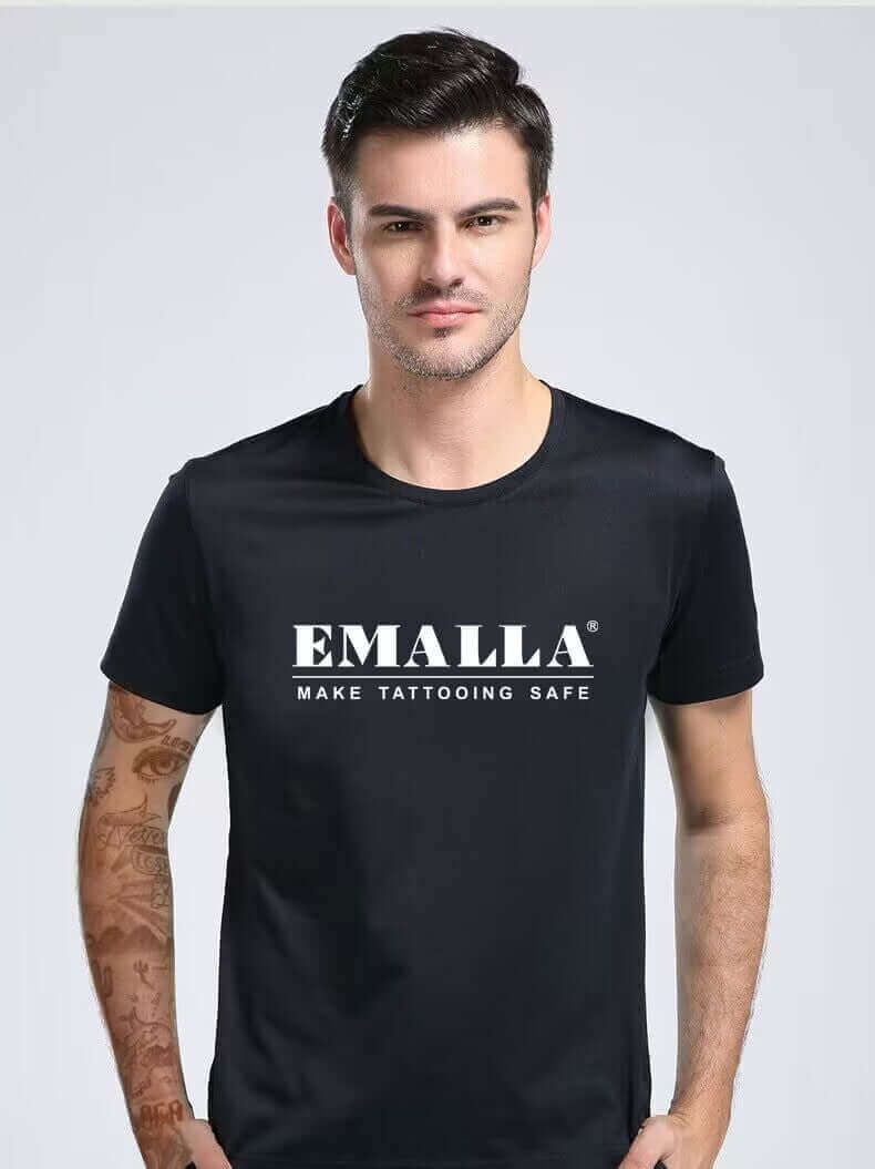 Emalla proteam artist wearing EMALLA T-Shirt with white "EMALLA" print on the front