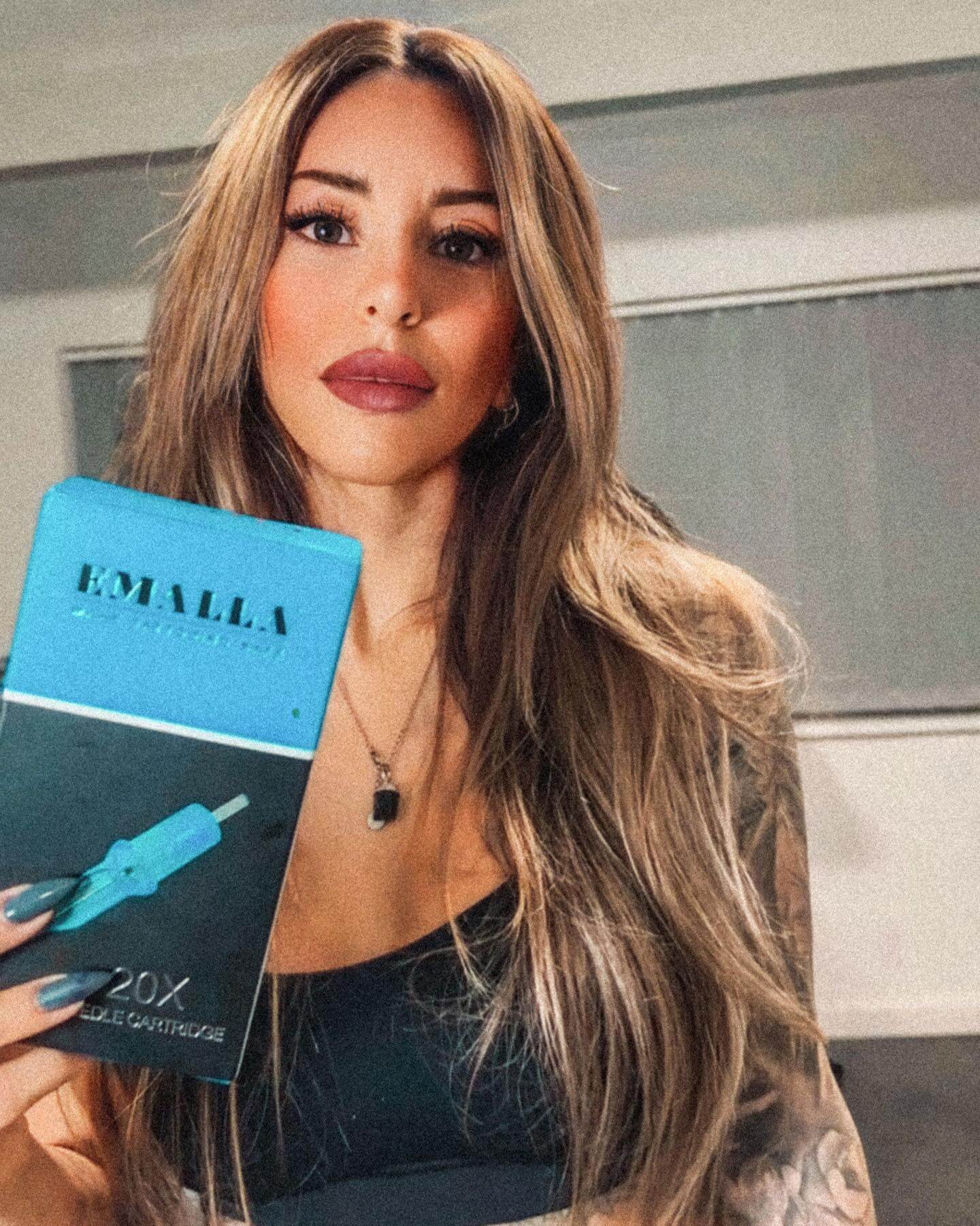 Emalla sponsored artist Paloma Salazar posing with Emalla needles.