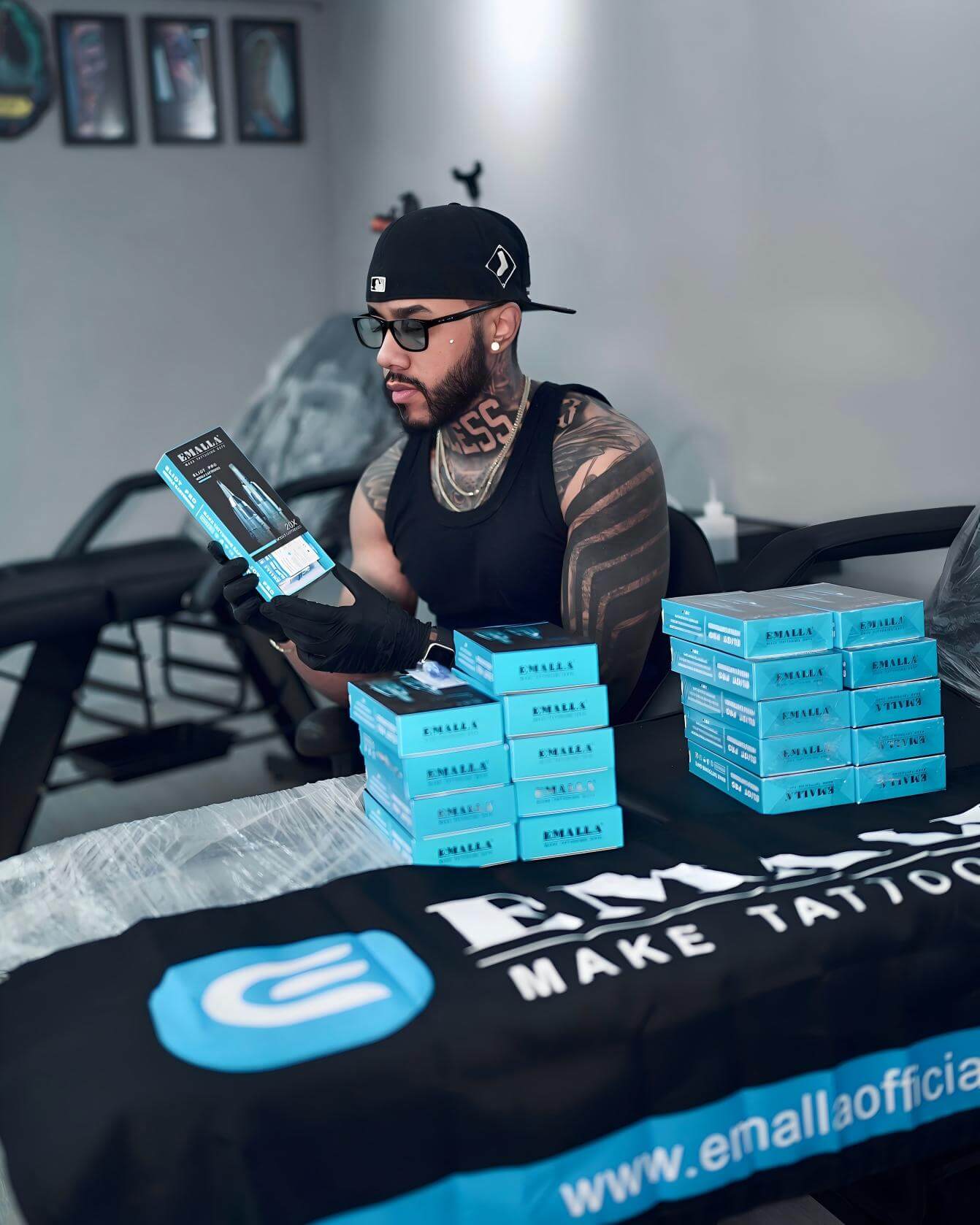 Professional tattoo artist Yordan poses with his trusted tool: the Emalla cartridge needles.