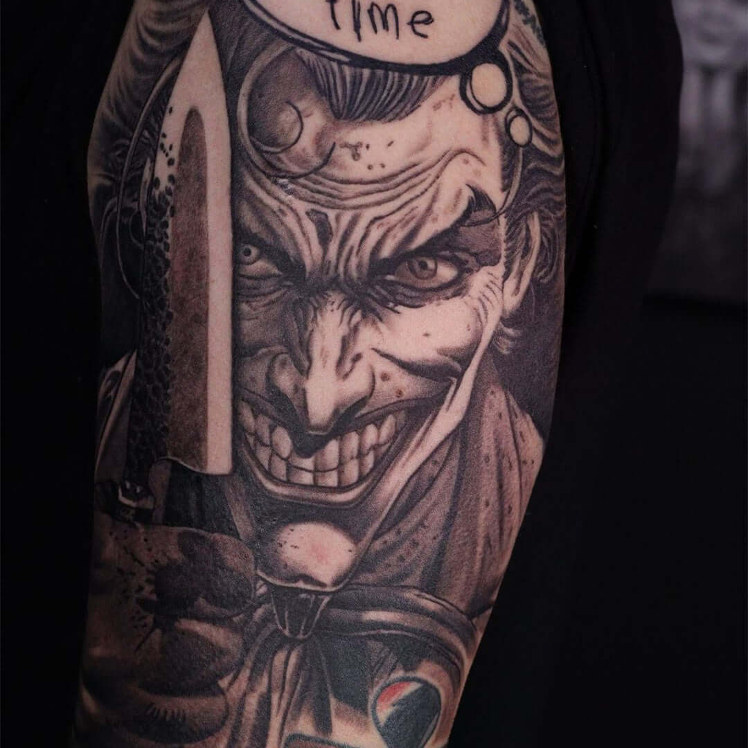 Black and grey realism sleeve piece by Emalla Eliot Cartridge Needles