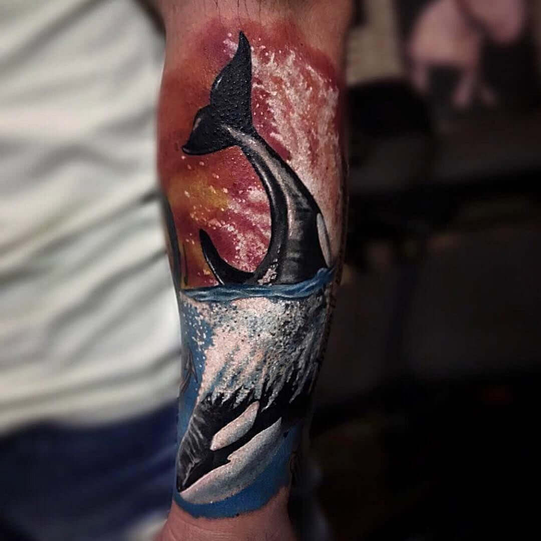 Dolphin tattoo full of color on the arm with Emalla Eliot Cartridge Needles