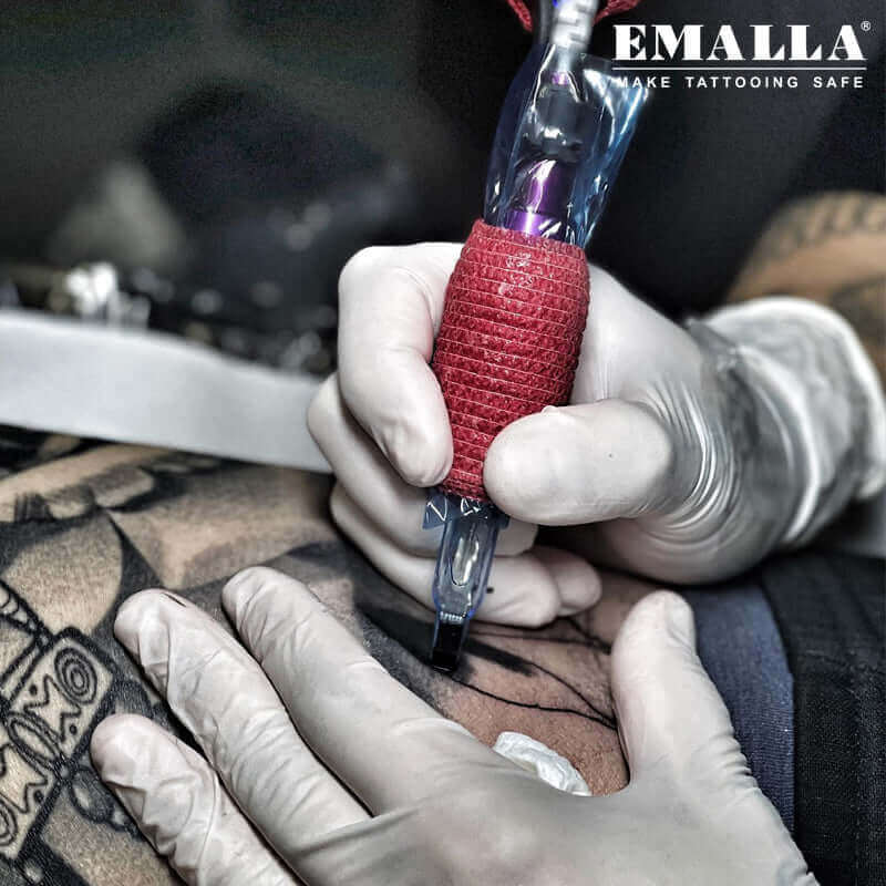 EMALLA Pro Team tattooist is tattooing with EMALLA ELIOT Tattoo Cartridge Needles Curved Magnum